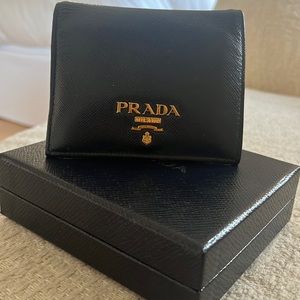 Black Prada fold wallet with fuchsia inside
